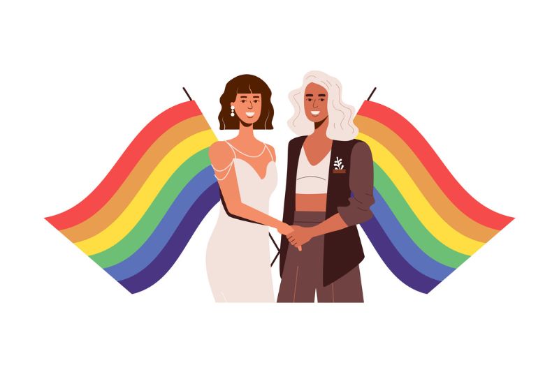 Ilustração de casal com 2 pessoas femininas de mãos dadas, com bandeiras do orgulho ao fundo. Em artigo sobre mês do orgulho